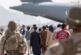 Inside Kabul airport, lack of food and water, high heat, big crowds drive 1 family to leave